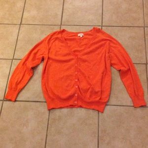 Long sleeve button up sweater.