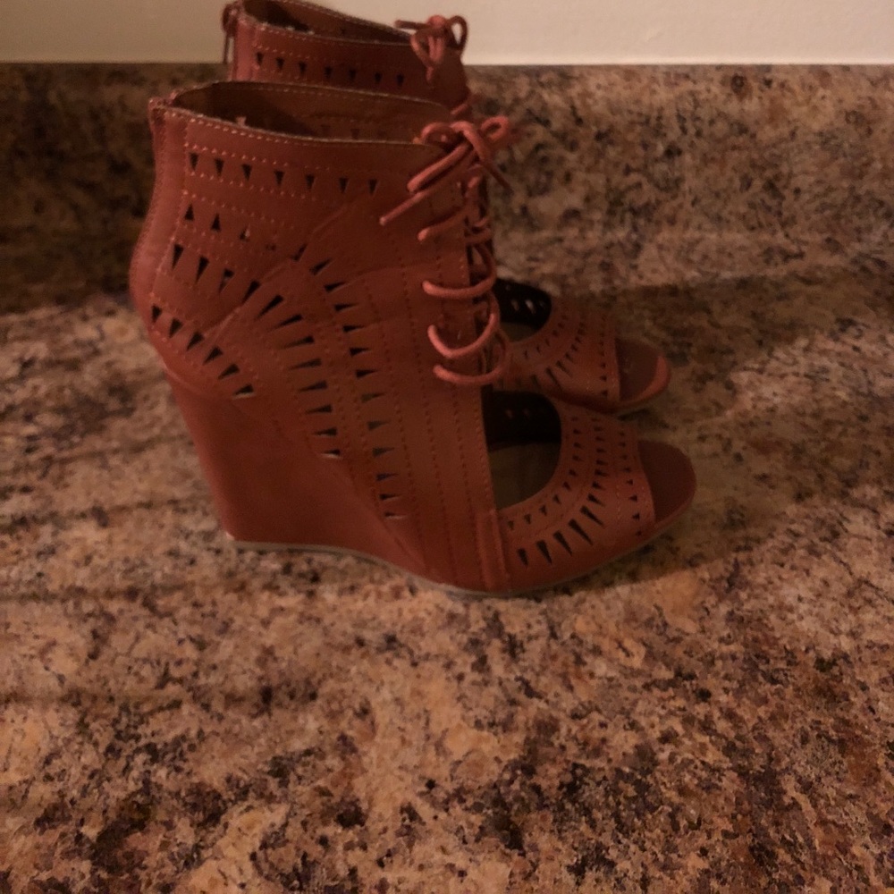 Worn once ankle lace up heals with cutouts