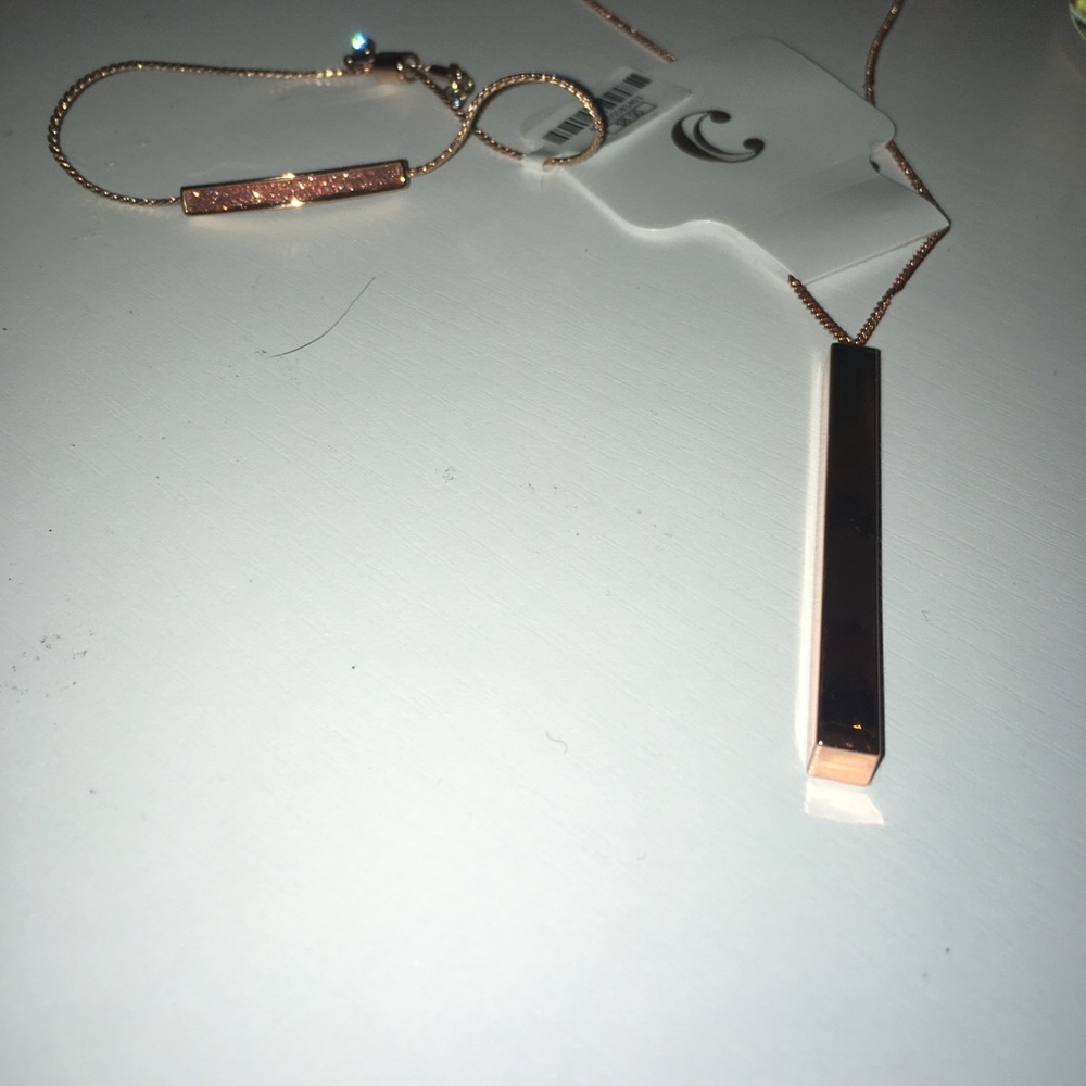 Rose gold stick necklace and sparkly bracelet