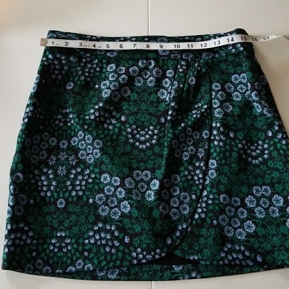 False wrap skirt with side zipper.