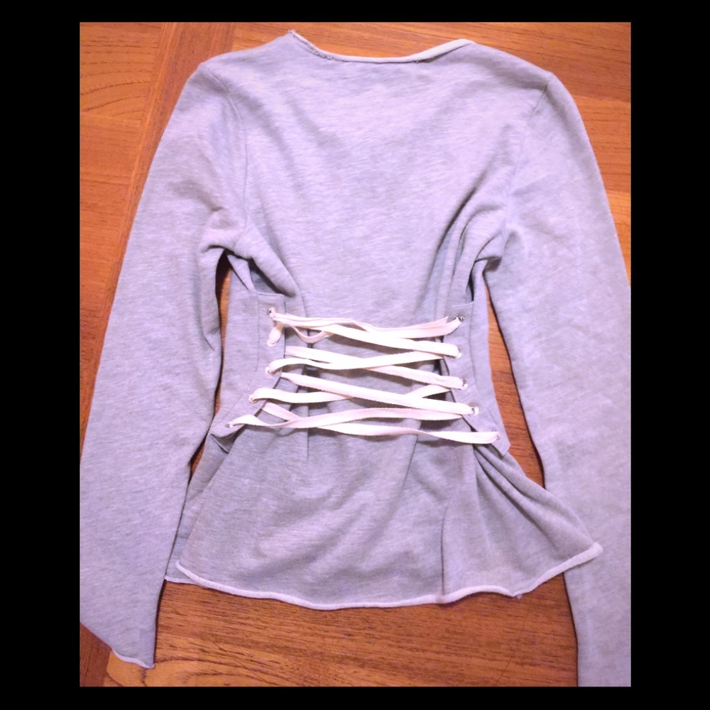 Really cute Grey sweatshirt with lace up back