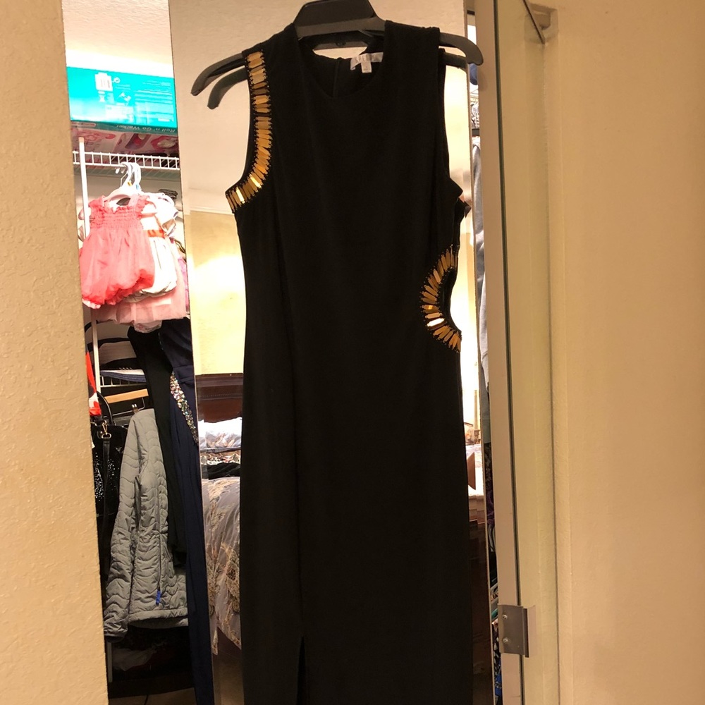Sold. Black  Maxi dress with gold accent