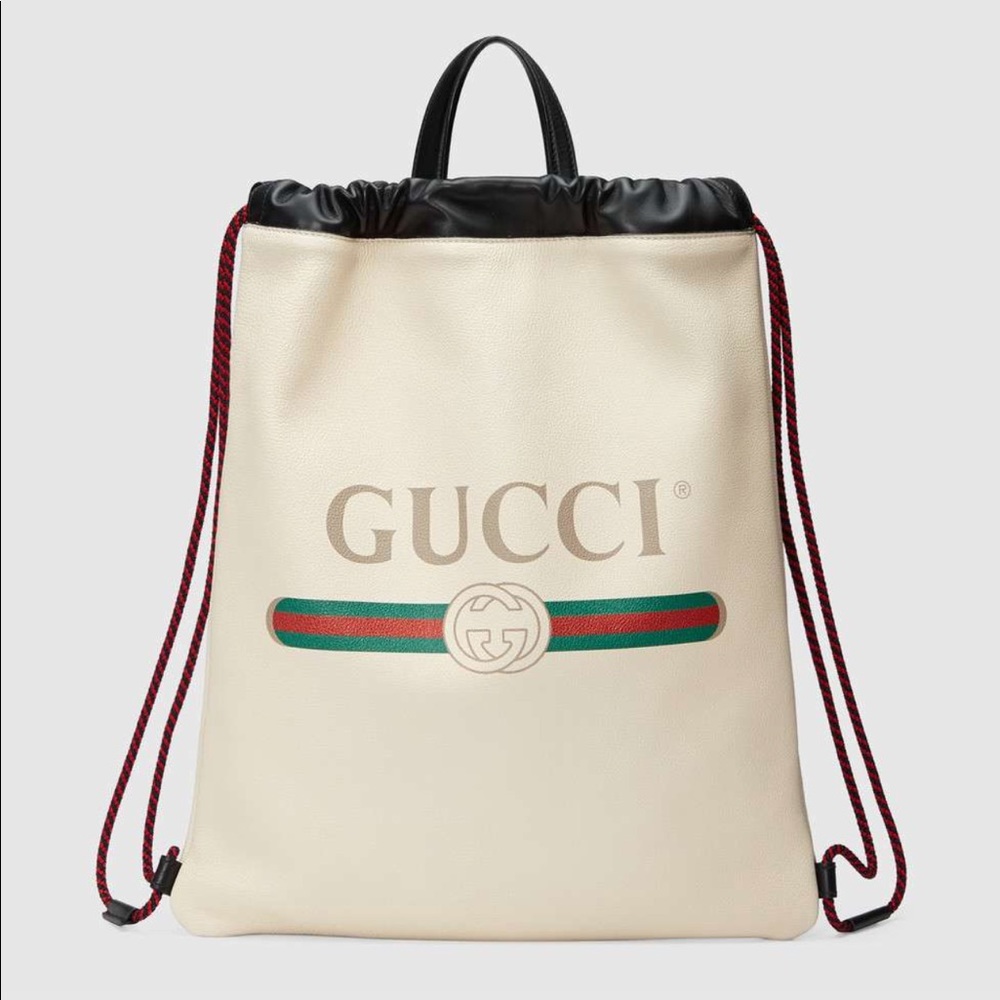 BRAND NEW GUCCI PRINT LEATHER DRAWSTRING BACKPACK