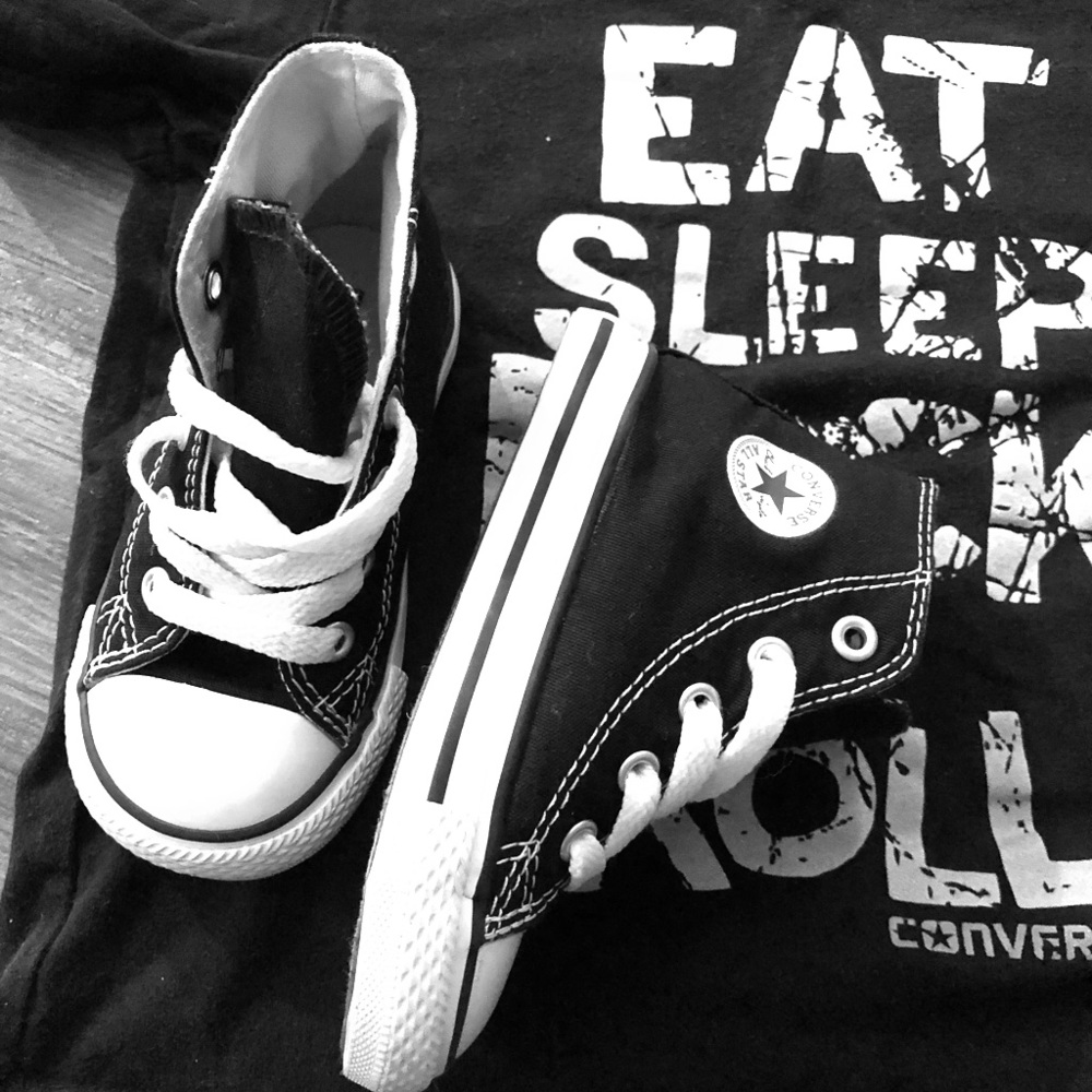 Black and white mid top converse