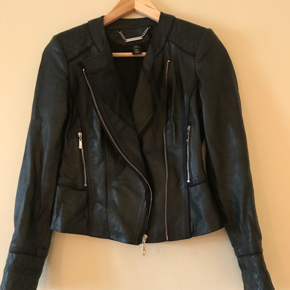 Leather jacket with Gros grain details.