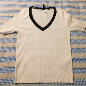 White ribbed shirt with black neckline