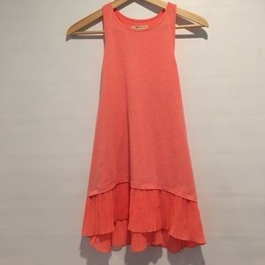 Long tank top with light flowy accent on bottom