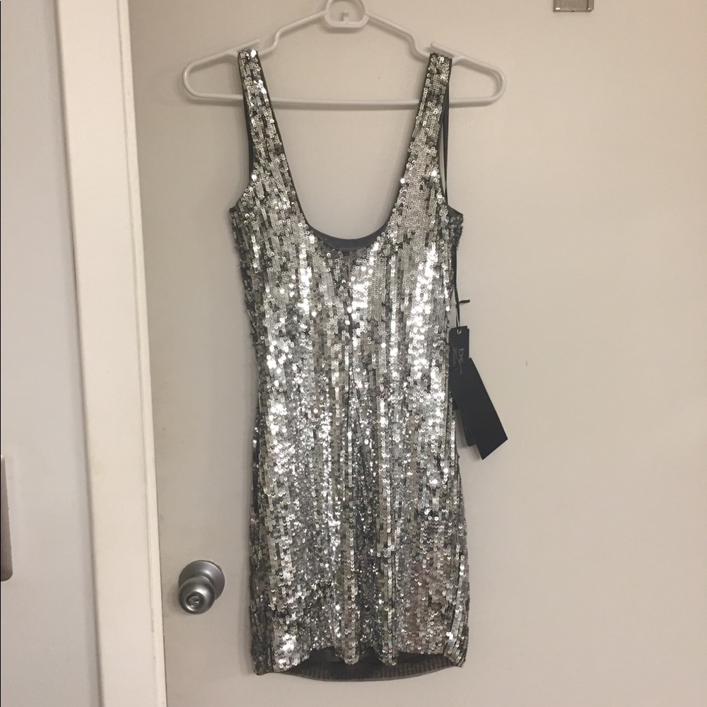 Silver fully sequined tank dress.