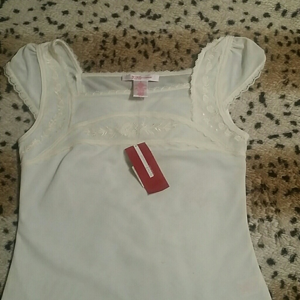 Eggshell colored tank top
