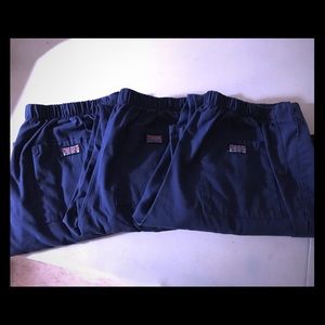 3 pair of navy blue Cherokee scrubs.