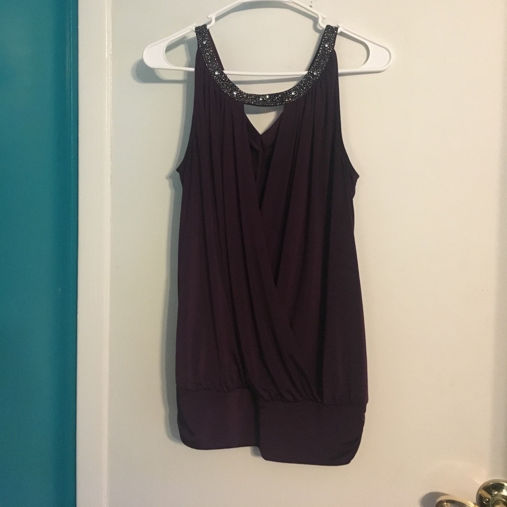 Express top with embellished neck