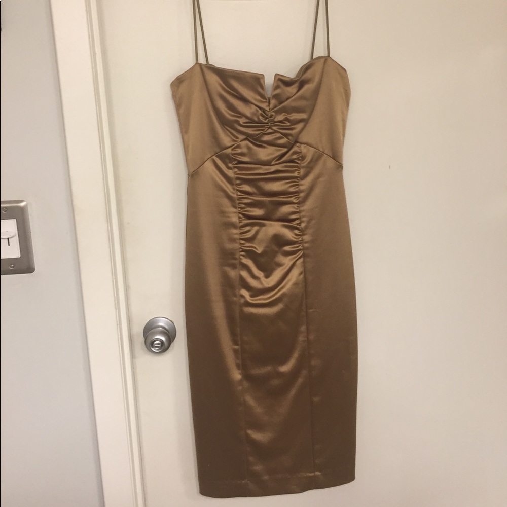 Nicole Miller ruched gold satin cocktail dress.