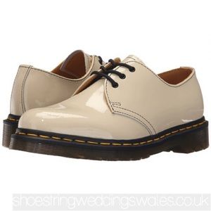 Dr. Martens 1461 lace up shoes.