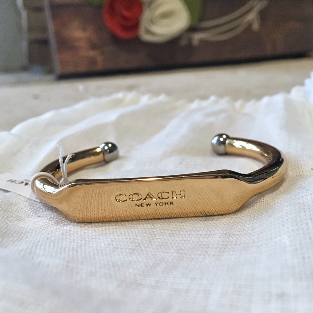 SOLD. NWT Coach gold and silver metal bracelet