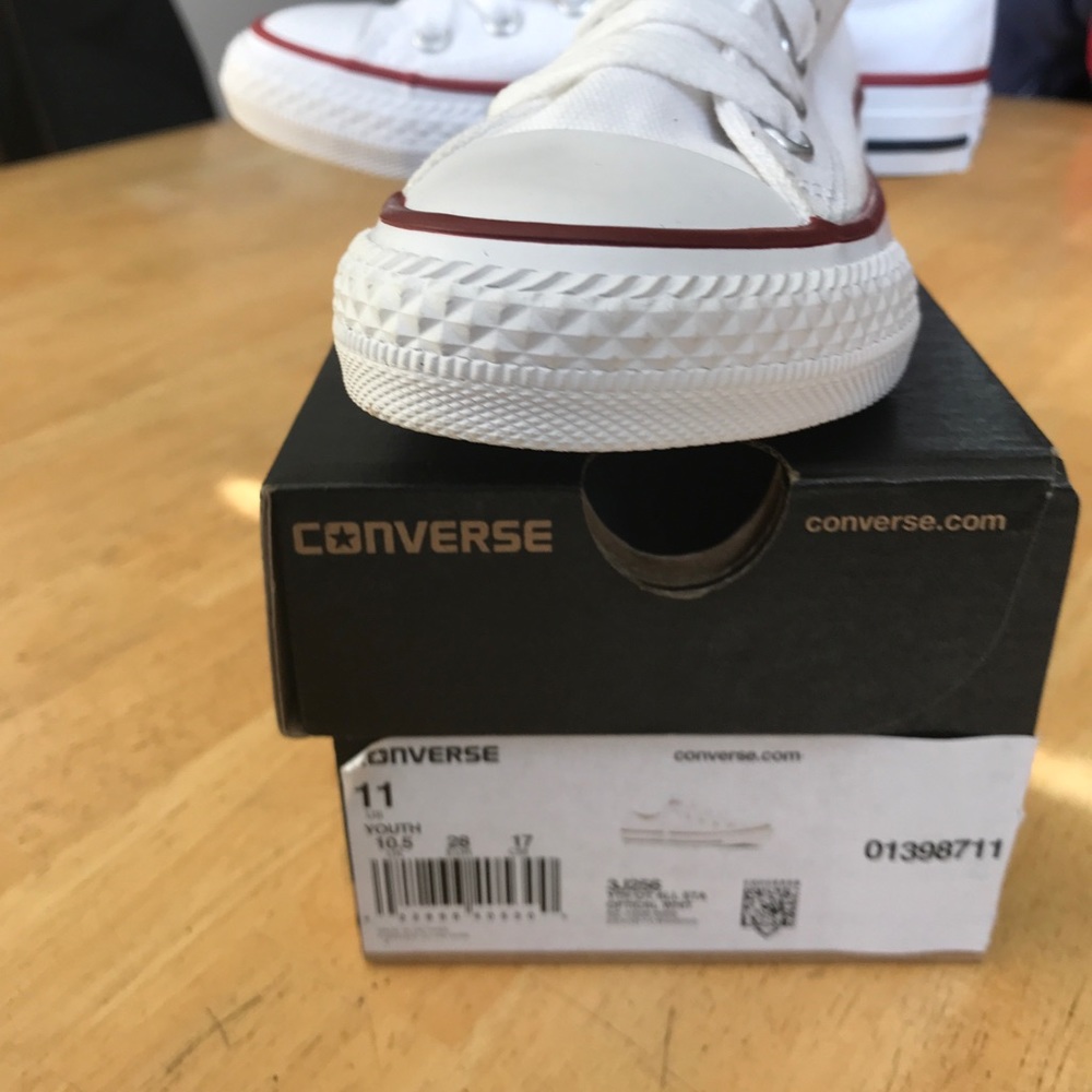 Brand new boys white converse.