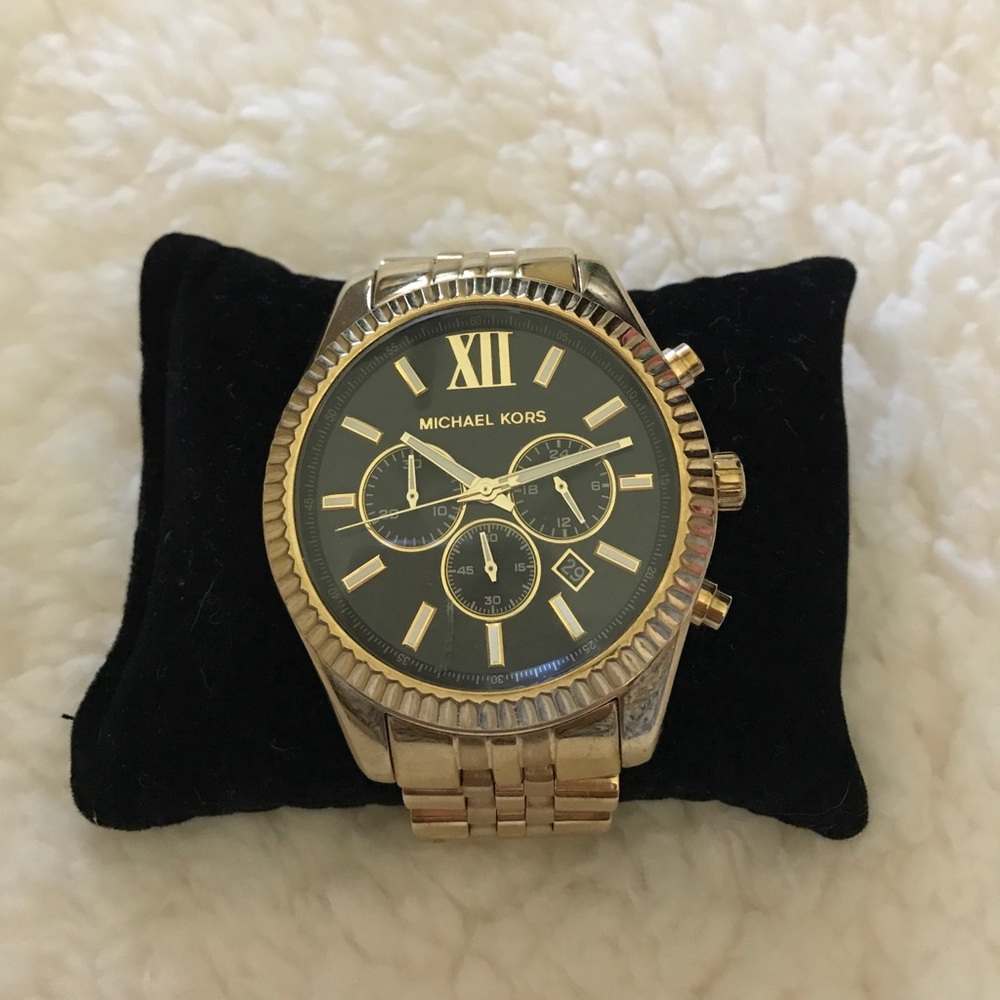 Unisex Black and Gold Michael Kors watch. Classy