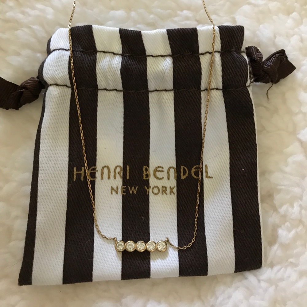Henri Bendel Gold necklace/ 4 rhinestone pendant