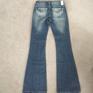 Brand new Vanity jeans, size 26x33