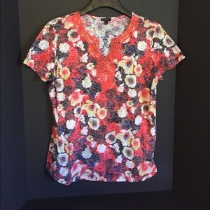 Lightweight summer blouse w/ gold accents.