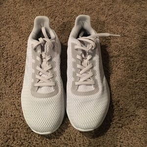 White Addias cloud foam tennis shoes