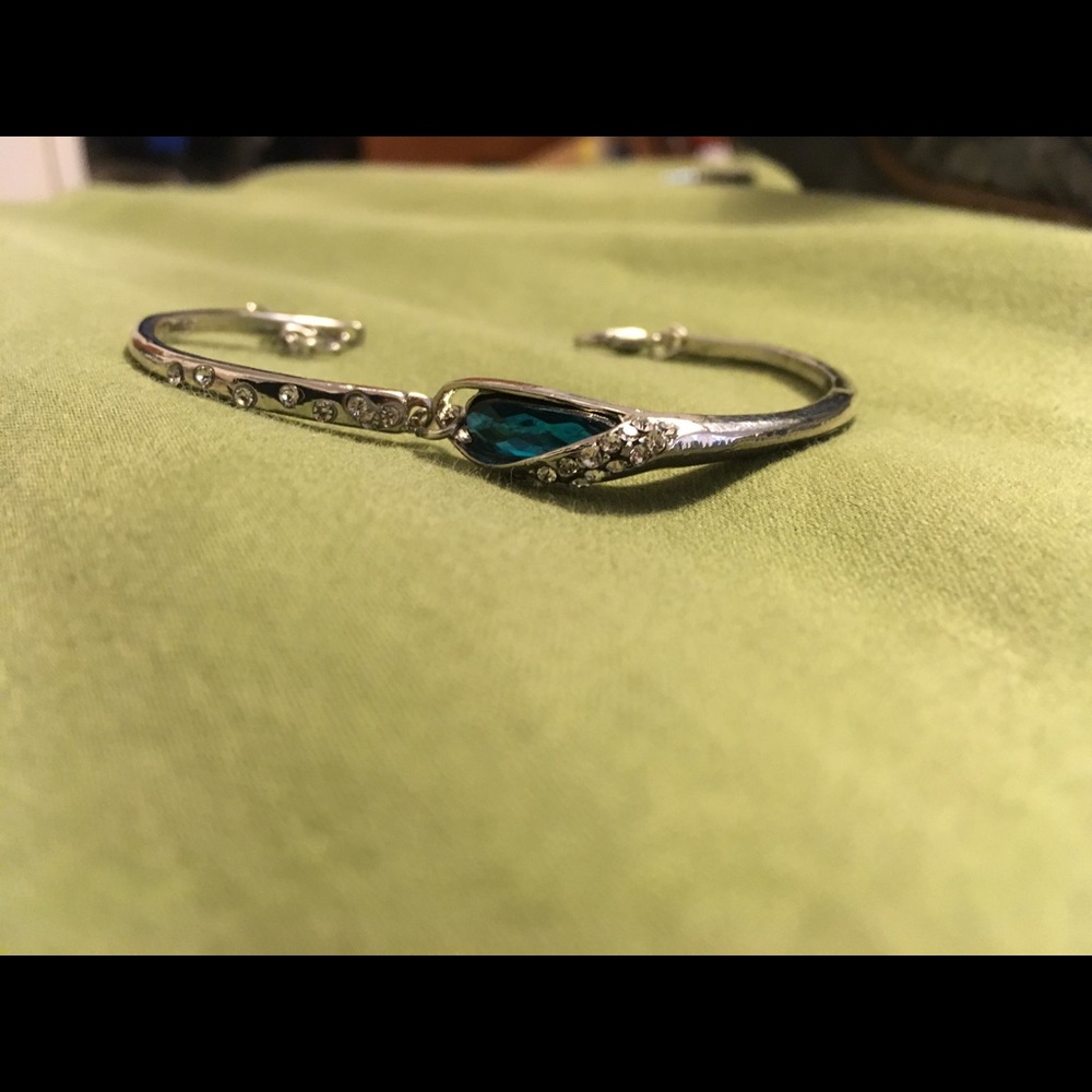 Cute silver bracelet with blue stone