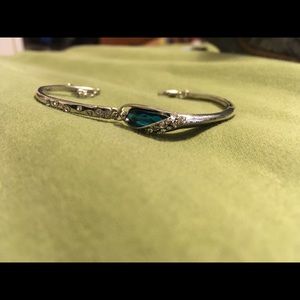 Cute silver bracelet with blue stone