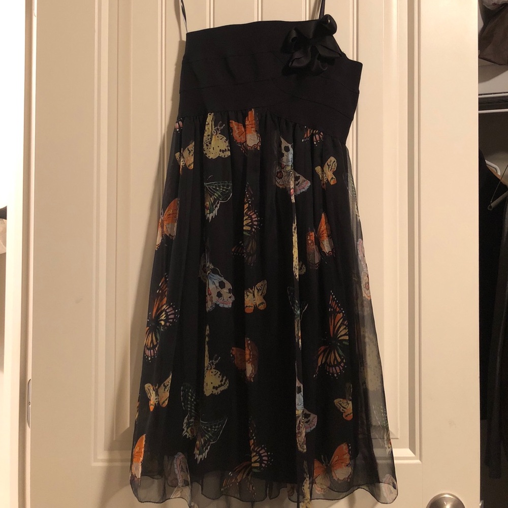 Asymmetrical neckline butterfly cocktail dress