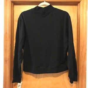 Black mock neck sweatshirt