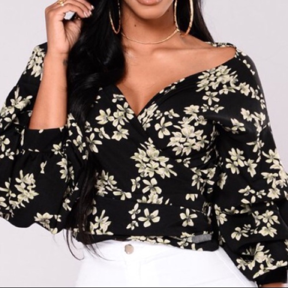 BRAND NEW. Floral wrap top.