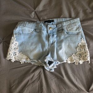 Jean shorts with lace on the sides