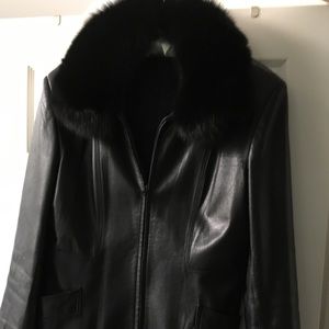 Black leather jacket with removable fox collar.