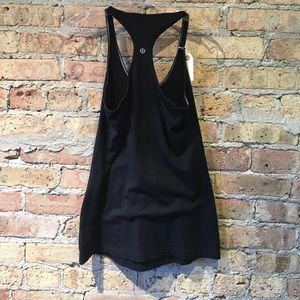 lululemon athletica Tops - Lululemon black razor back tank size 6 lululemon athletica Tops - Lululemon black razor back tank size 6