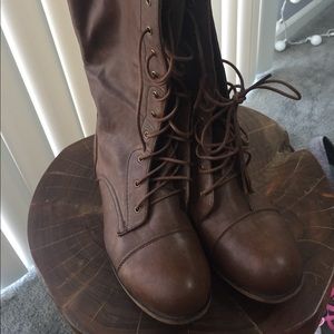 Faux leather boots with flannel accent