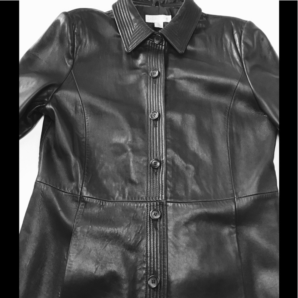 Lightweight, long, leather coat.