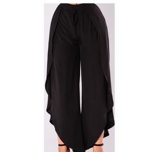 BRAND NEW. Spit pants flow pants.