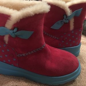 Size 5 UGGs new without tags.