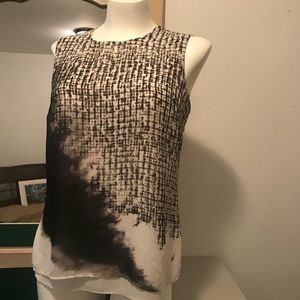 Black, white, and gray sleeveless blouse