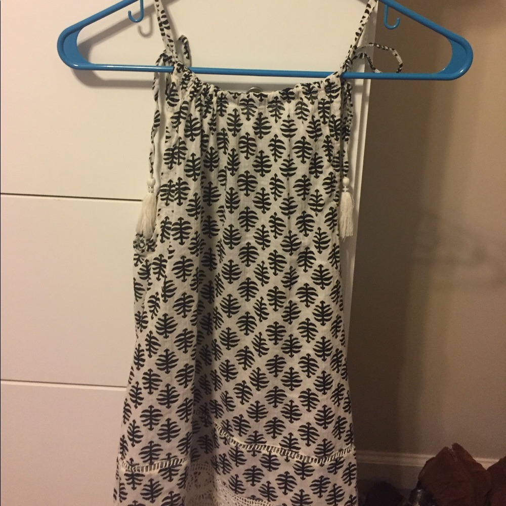 NWOT CHIC TOP!!! Tassels hanging from shoulders