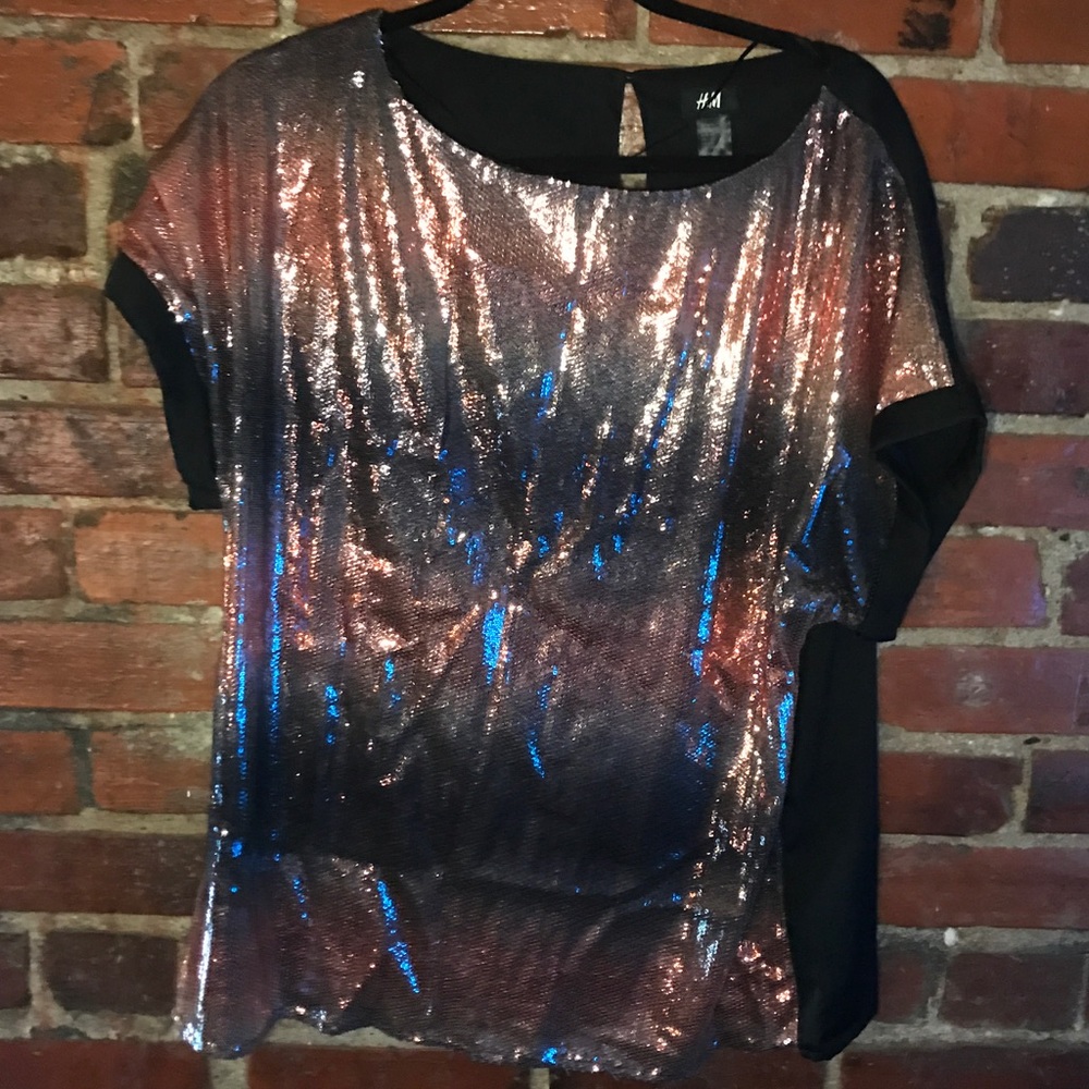 Shine bright in this sparkly H&M top! Size 12
