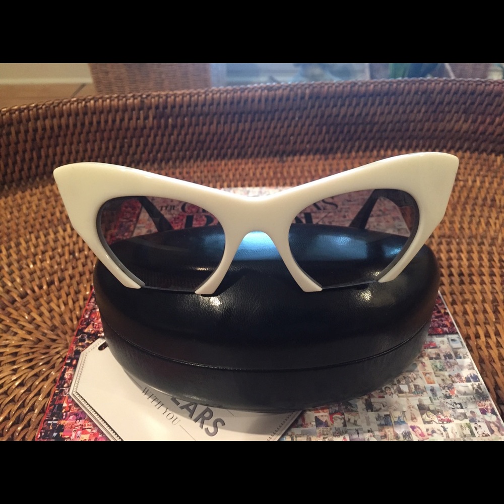 MIU MIU Black and White Cat- Eye Sunglasses.