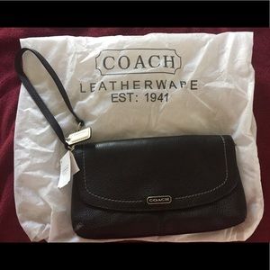 Leather coach large flap wristlet. New with tags.