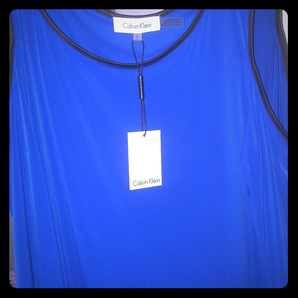 Calvin Klein blue shirt large. Smoke and pet free