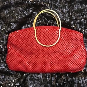 Vintage mesh clutch with gold tone metal handles