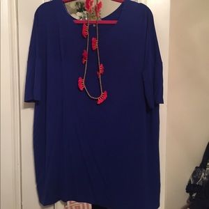 Emma's closet blue piko. Size M.