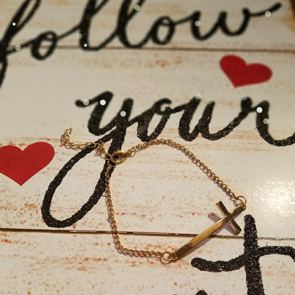 Curved cross bracelet.