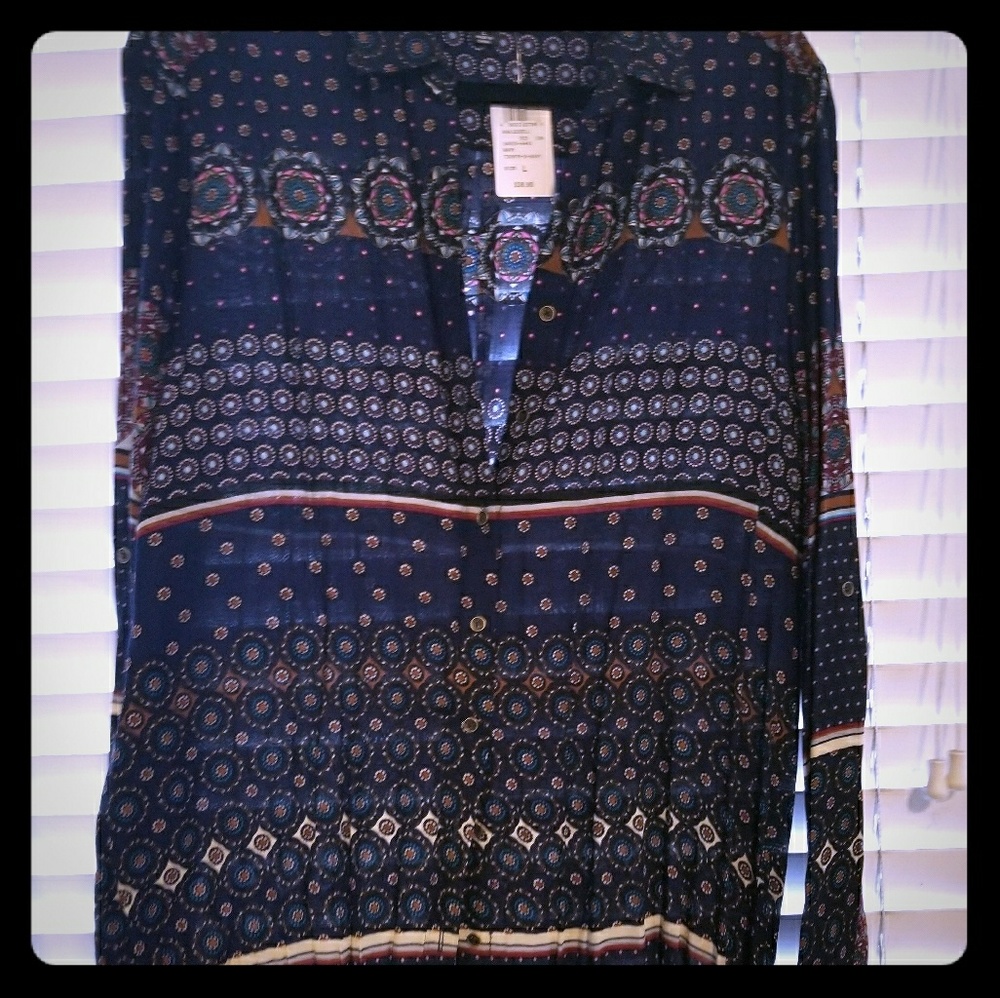 Above the knee long sleeve tunic/dress.