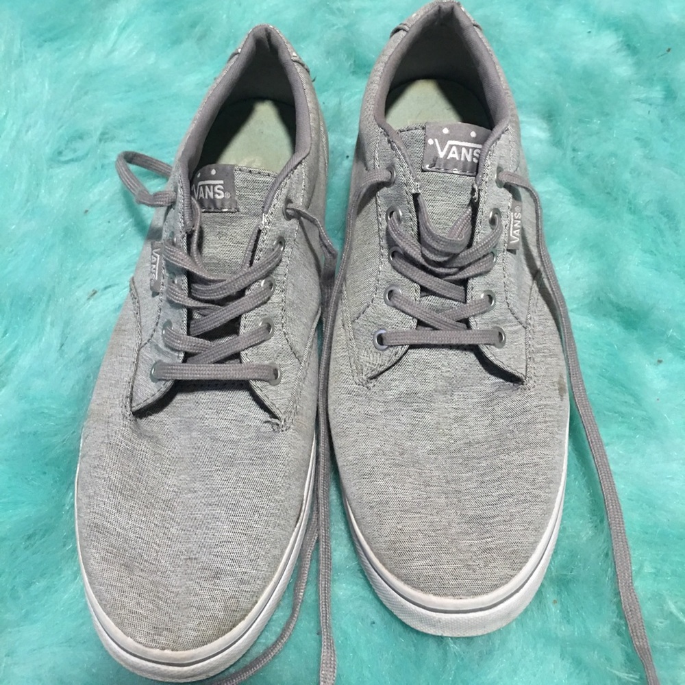 Gray and white polka dot Vans sneakers
