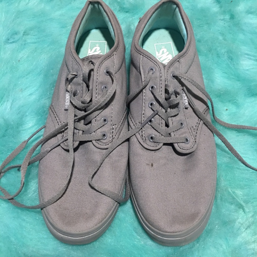 All gray vans with teal on inside