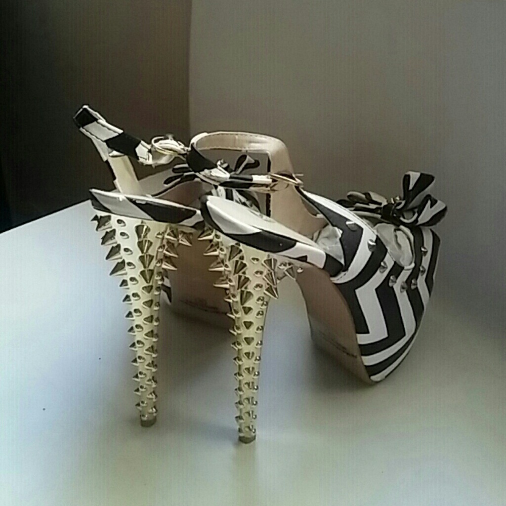 Gold spike heels