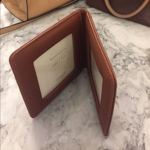 Coach photo holder. Holds 2 3"x3" photos. Leather.